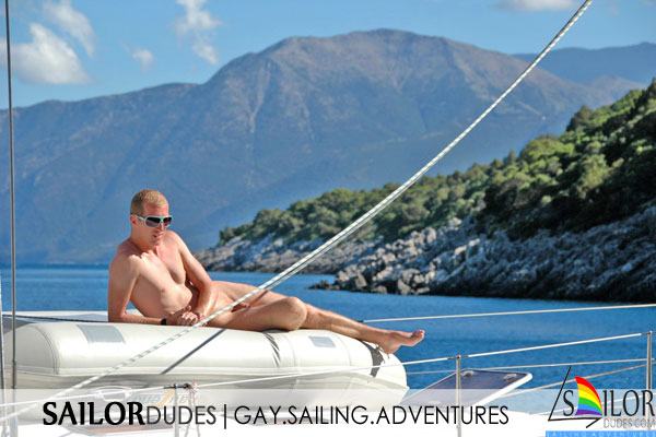 Naked gay on sailing yacht deck